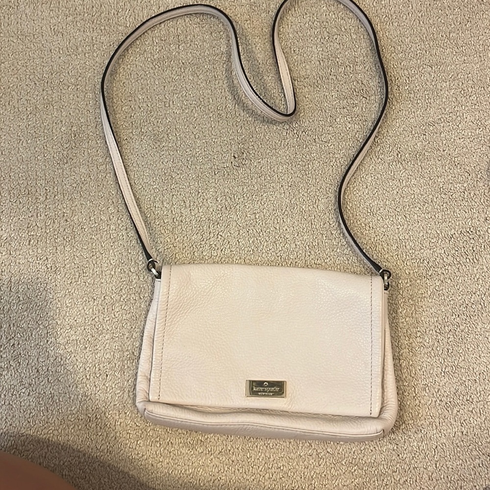 Off the shoulder, Kate Spade purse